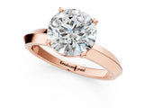Rose gold Round Cut Solitaire Engagement Ring with Flat Band and Four-Prong Setting 1