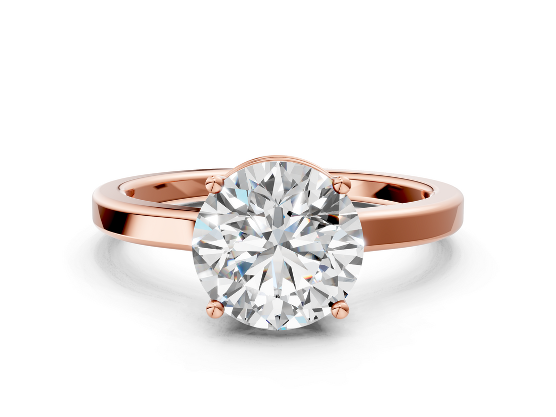 Rose gold Round Cut Solitaire Engagement Ring with Four-Prong Setting on a Classic Band_54