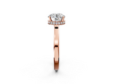 Rose gold Round Cut Solitaire Engagement Ring with Four-Prong Setting on a Classic Band_56