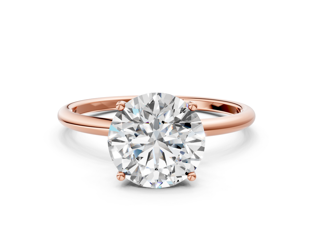 Rose gold Round Cut Solitaire Engagement Ring with Thin Band and Four-Prong Setting_3