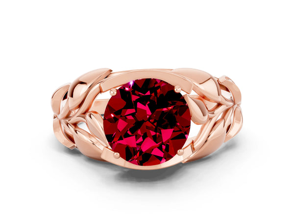 Rose gold Round Cut Garnet Leaf-Inspired Engagement Ring with Round Accents and Prong Setting
