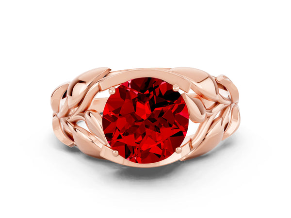 Rose gold Round Cut Ruby Leaf-Inspired Engagement Ring with Round Accents and Prong Setting