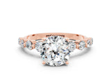 Rose gold Round Cut Solitaire Moissanite Ring with Pave Band and Four-Prong Setting