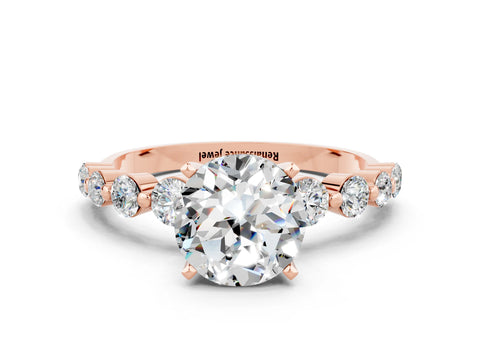 Rose gold Round Cut Solitaire Moissanite Ring with Pave Band and Four-Prong Setting