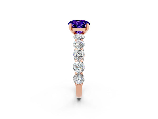 Rose gold Round Cut Tanzanite Prong Setting with Side Stones on a Pave Band