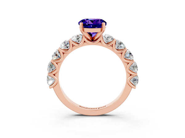 Rose gold Round Cut Tanzanite Prong Setting with Side Stones on a Pave Band