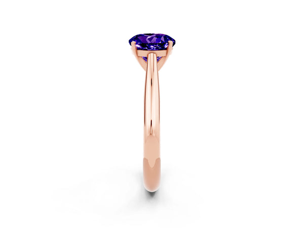 Rose gold Round Cut Tanzanite Solitaire Engagement Ring with Cathedral Setting and Four-Prong Mount