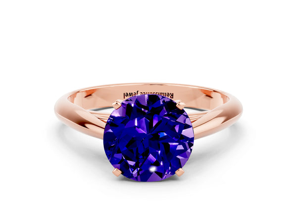 Rose gold Round Cut Tanzanite Solitaire Engagement Ring with Cathedral Setting and Four-Prong Mount