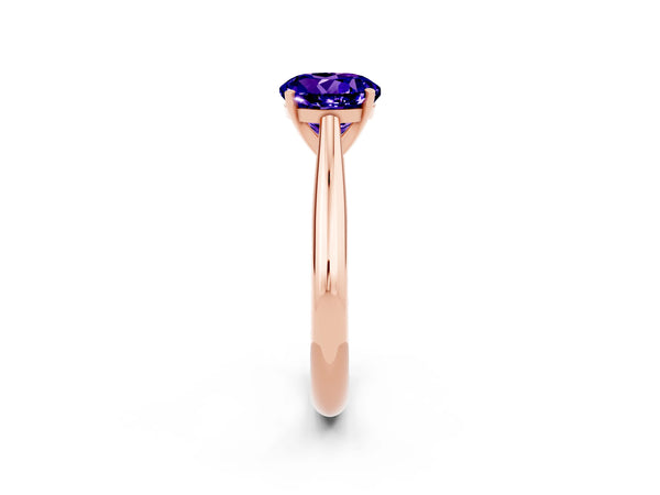 Rose gold Round Cut Tanzanite Solitaire Engagement Ring with Cathedral Setting and Four-Prong Mount