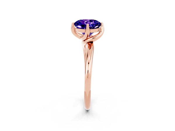 Rose gold Round Cut Tanzanite Solitaire Engagement Ring with Four-Prong Setting and Classic Band