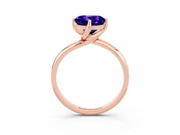 Rose gold Round Cut Tanzanite Solitaire Engagement Ring with Four-Prong Setting and Classic Band
