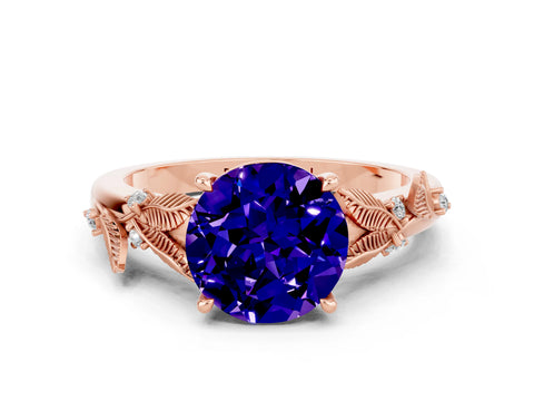 Rose gold Round Cut Tanzanite Solitaire Ring with Leaf Motif Band and Four-Prong Setting