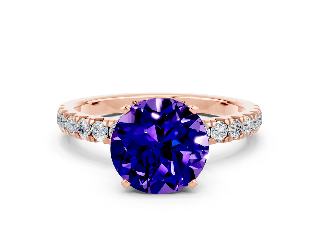 Rose gold Round Cut Tanzanite Solitaire Ring with Pavé Accents and Four-Prong Setting