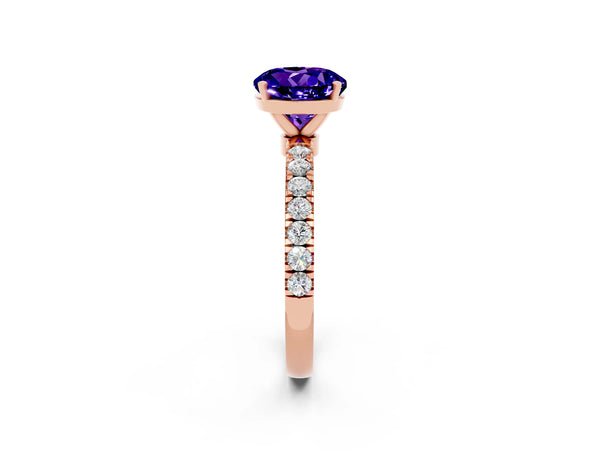 Rose gold Round Cut Tanzanite Solitaire Ring with Pavé Accents and Four-Prong Setting