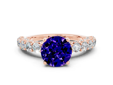Rose gold Round Cut Tanzanite Solitaire Ring with Shared Prong Pavé Band and Four-Prong Setting
