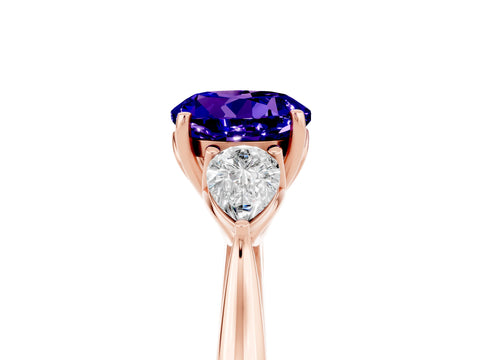 Rose gold Round Cut Tanzanite Three-Stone Ring with Pear Side Stones and Four-Prong Setting_17