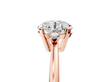 Rose gold Round Cut Three-Stone Solitaire Ring with Round Accent Diamonds and Four-Prong Setting_38