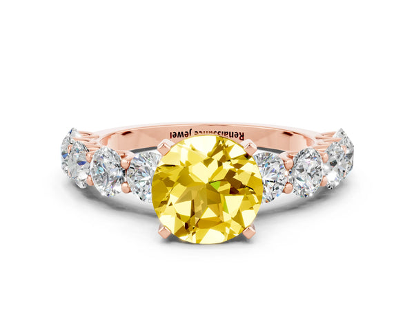 Rose gold Round Cut Yellow Sapphire Prong Setting with Side Stones on a Pave Band