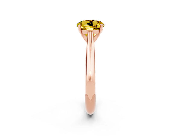 Rose gold Round Cut Yellow Sapphire Solitaire Engagement Ring with Cathedral Setting and Four-Prong Mount