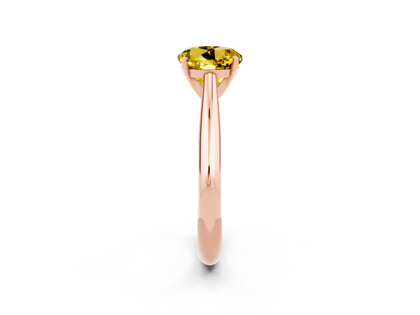 Rose gold Round Cut Yellow Sapphire Solitaire Engagement Ring with Cathedral Setting and Four-Prong Mount