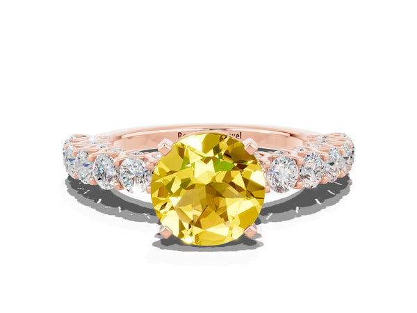 Rose gold Round Cut Yellow Sapphire Solitaire Ring with Shared Prong Pavé Band and Four-Prong Setting