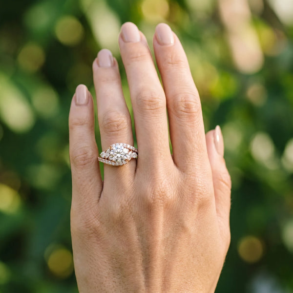 Rose gold Round Diamond Halo Ring with Marquise and Pavé Band in Prong Setting