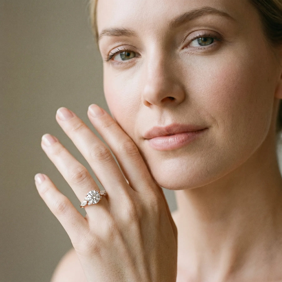 Rose gold Round Diamond Halo Ring with Marquise and Pavé Band in Prong Setting