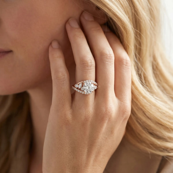 Rose gold Round Diamond Halo Ring with Marquise and Pavé Band in Prong Setting