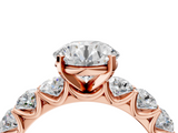 Rose gold Round Diamond Prong Setting with Side Stones on a Pave Band_112