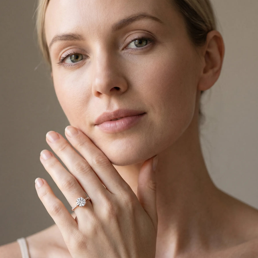 Rose gold Round Diamond Solitaire Ring with Pavé Accent Band and Four-Prong Setting