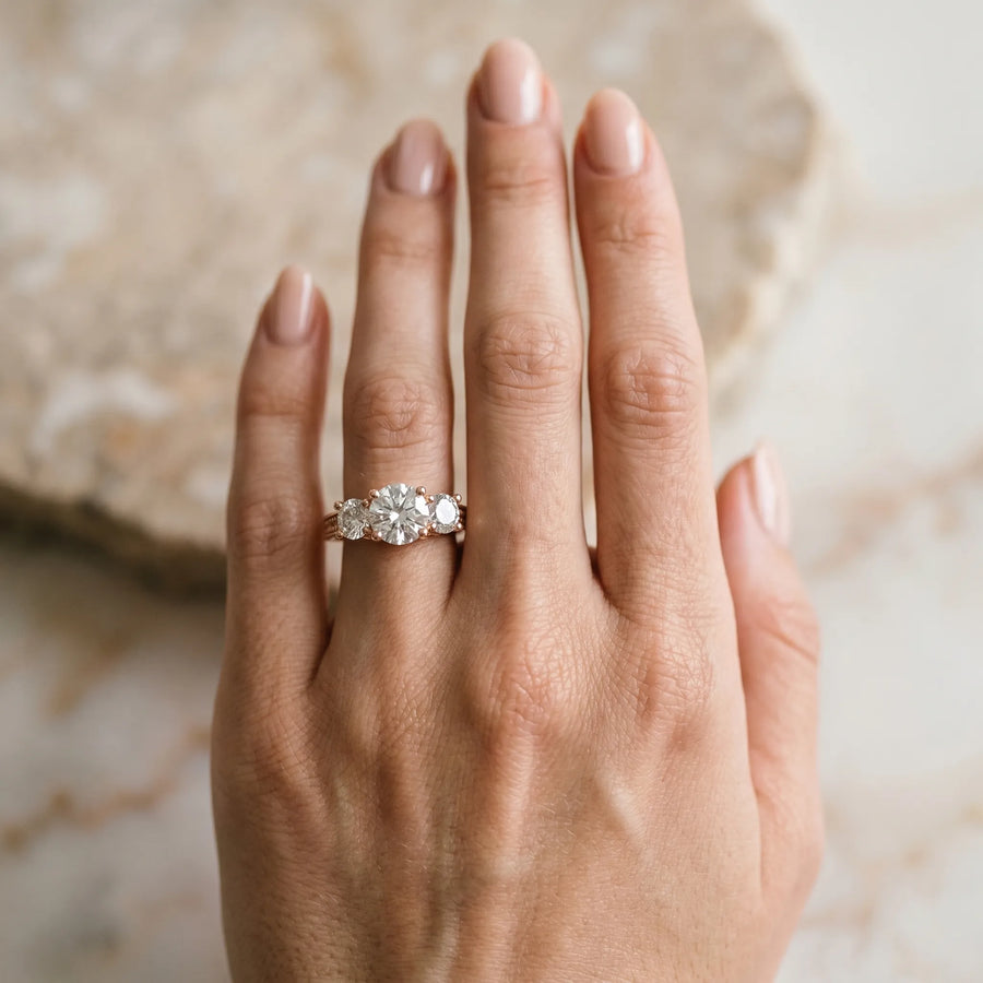 Rose gold Round Diamond Three-Stone Ring with Prong Setting and Textured Band