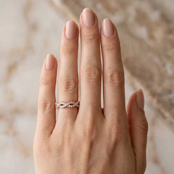 Rose gold Round Diamond Twisted Eternity Band with Pavé and Shared Prong Setting