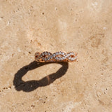 Rose gold Round Diamond Twisted Eternity Band with Pavé and Shared Prong Setting