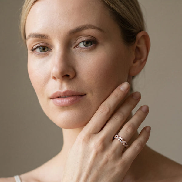 Rose gold Round Diamond Twisted Eternity Band with Pavé and Shared Prong Setting