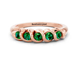 Rose gold Round Emerald Eternity Band with Twist Prong Setting_6