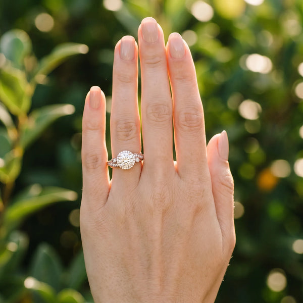 Rose gold Round Halo Diamond Ring with Milgrain and Bezel Accents on a Split Shank Band