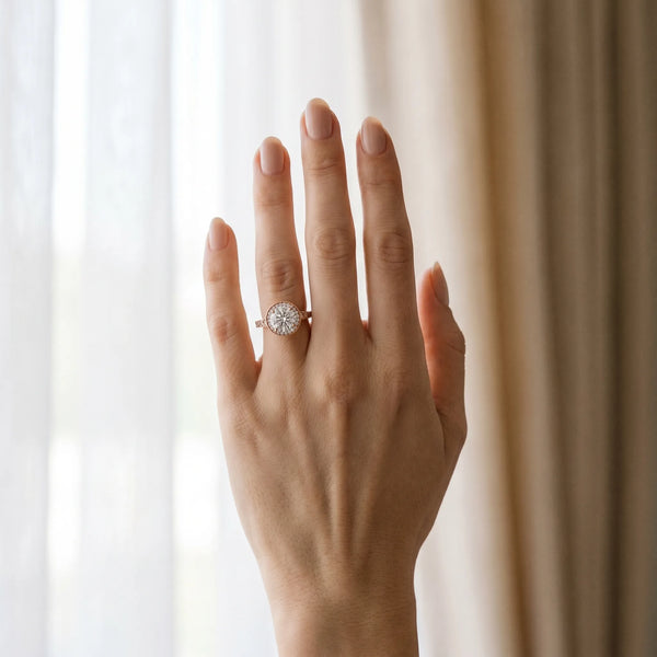 Rose gold Round Halo Milgrain Solitaire with Bezel Set Side Stones and Pave Band