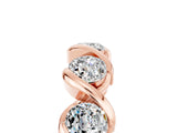 Rose gold Round Moissanite Wave Band with Channel Setting and Shared Prongs_11