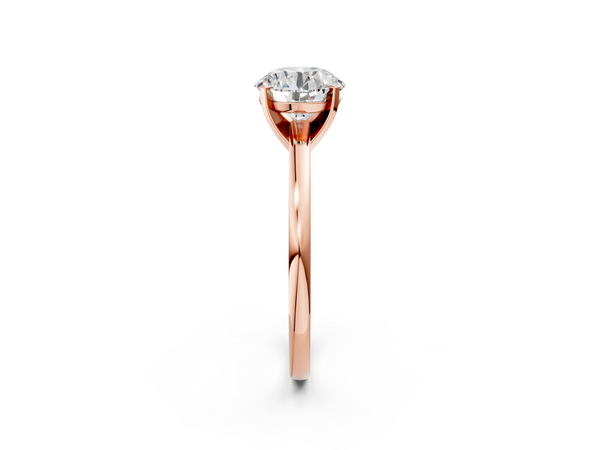 Rose gold Round Solitaire Diamond Engagement Ring with Four-Prong Setting on a Classic Band