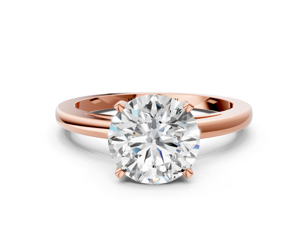 Rose gold Round Solitaire Diamond Engagement Ring with Four-Prong Setting on a Classic Band