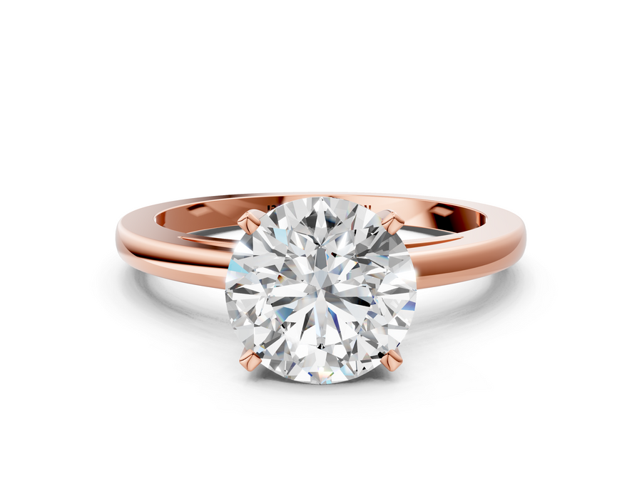 Rose gold Round Solitaire Diamond Engagement Ring with Four-Prong Setting on a Classic Band