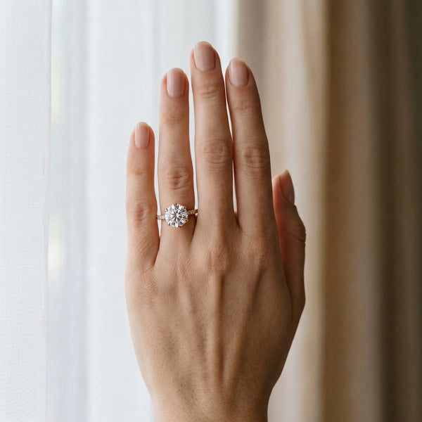 Rose gold Round Solitaire Diamond Engagement Ring with Pave Band and Six-Prong Setting