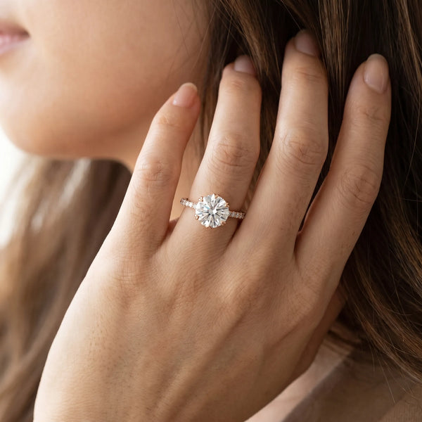 Rose gold Round Solitaire Diamond Engagement Ring with Pave Band and Six-Prong Setting