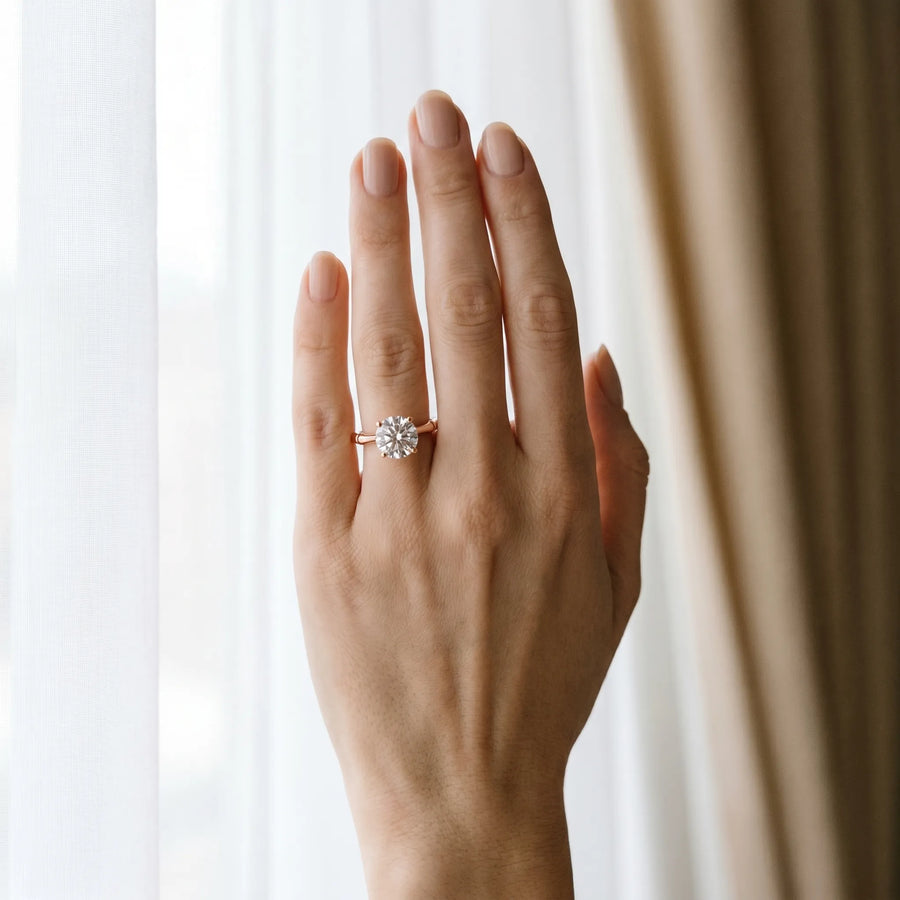Rose gold Round Solitaire Diamond Ring with Bamboo Band and Four-Prong Setting