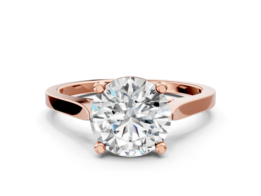Rose gold Round Solitaire Diamond Ring with Four-Prong Setting and Tapered Band