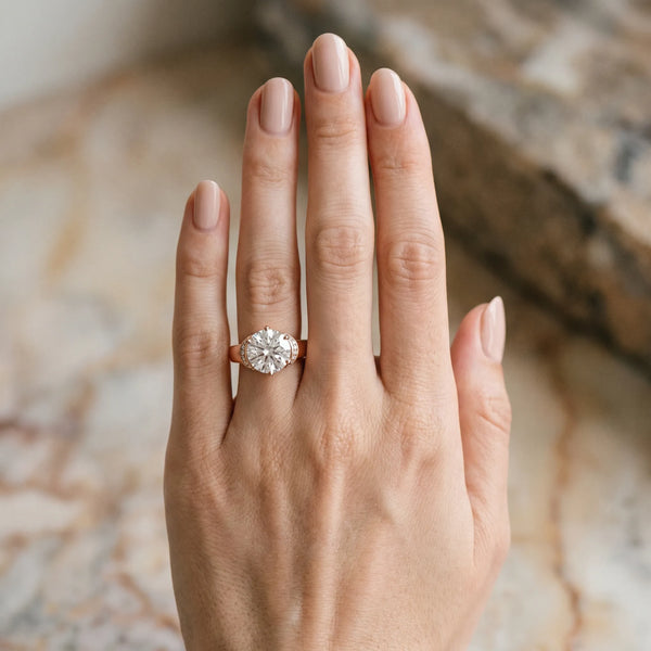 Rose gold Round Solitaire Diamond Ring with Pave Band and Six-Prong Setting