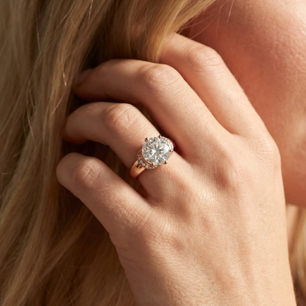 Rose gold Round Solitaire Diamond Ring with Pave Band and Six-Prong Setting
