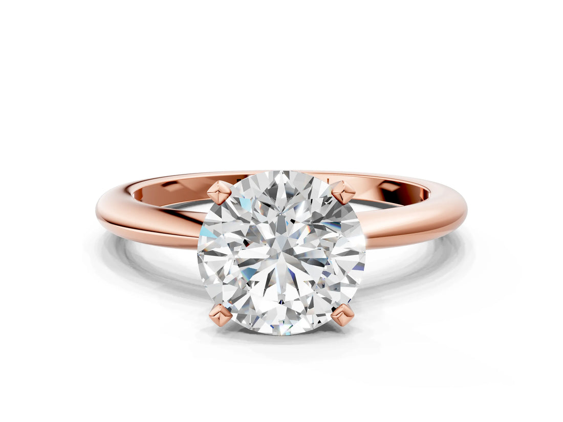 Rose gold Round Solitaire Diamond Ring with Six-Prong Setting on a Classic Band