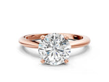 Rose gold Round Solitaire Diamond Ring with Six-Prong Setting on a Classic Band