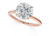 Rose gold Round Solitaire Diamond Ring with a Classic Band and Four-Prong Setting 1